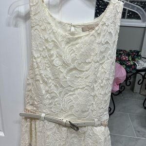 White lace peplum top with braided belt